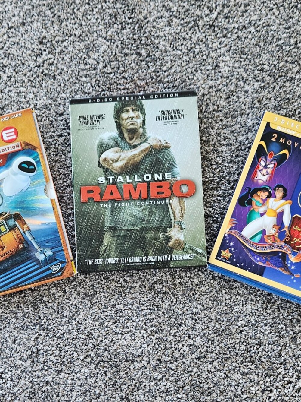 3 DVD Movies, Aladdin, Wall.E and Rambo. One unopened.
